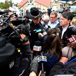 Schoharie County Sheriff Ronald Stevens,left, New York State Sen. James Seward,center, and Rep. John Faso, R-N.Y.,speak to reporters at the scene of Saturday's fatal limousine crash in Schoharie, N.Y., . A limousine loaded with revelers heading to a 30th birthday slammed into an SUV parked outside a store, killing all people in the limo and two pedestrians.<br>